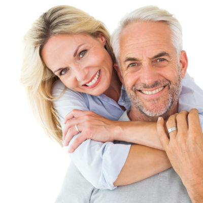 woman hugging man around neck