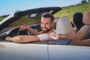 man in convertable